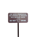 brown recycled water sign used to identify landscape areas using recycled water in Irvine, California.