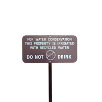 brown recycled water sign used to identify landscape areas using recycled water in Irvine, California.