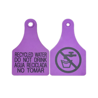 Two purple recycled water tags used to identify landscape irrigation systems that use recycled water