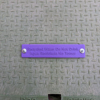 Purple recycled water valve ID tag used to identify landscape irrigation valves using recycled water