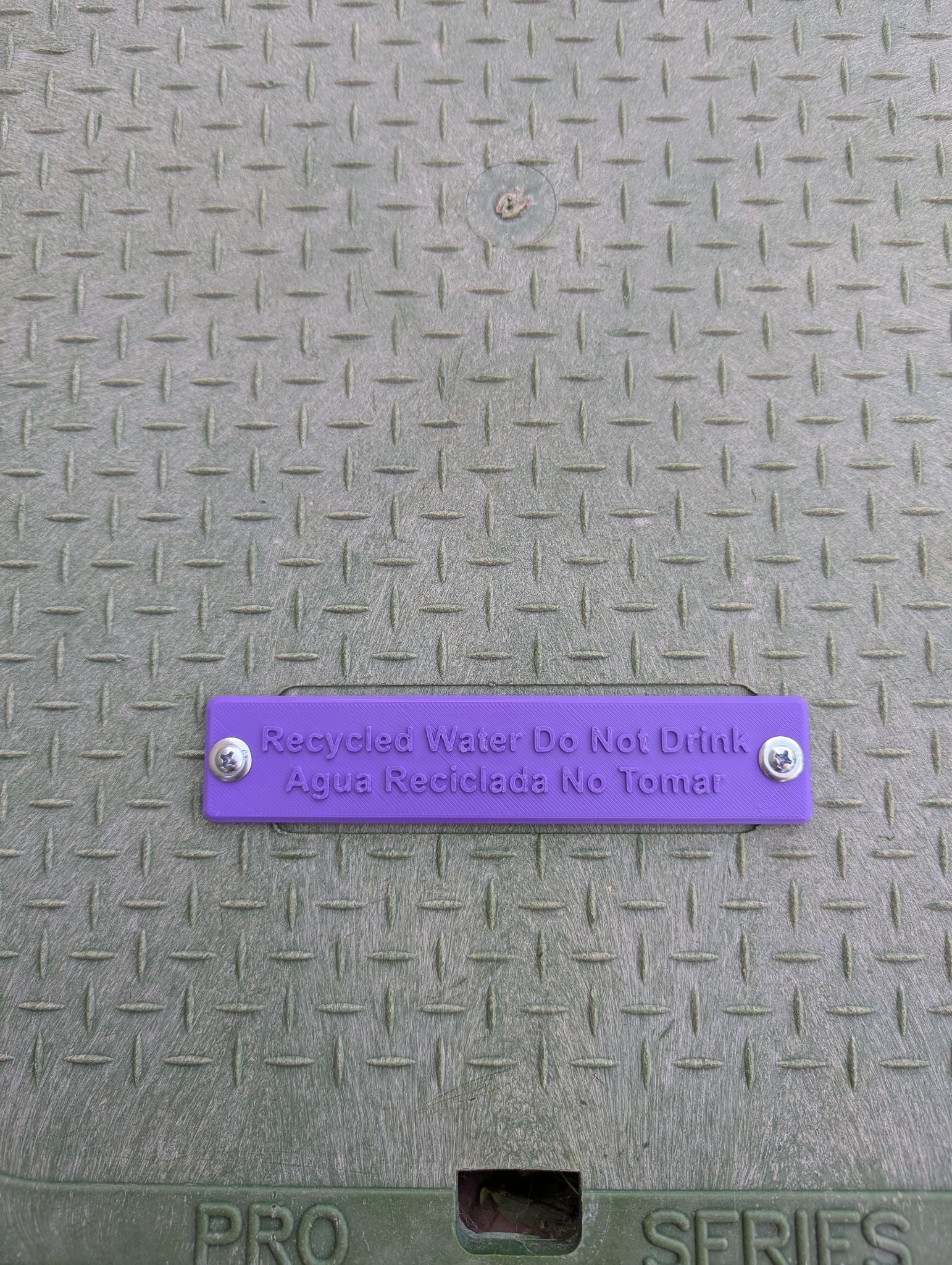 Purple recycled water valve ID tag used to identify landscape irrigation valves using recycled water